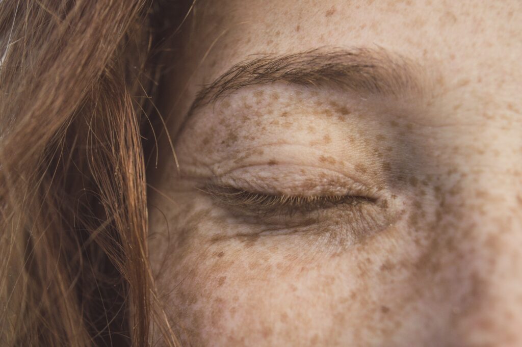 Close up of woman closing her eye